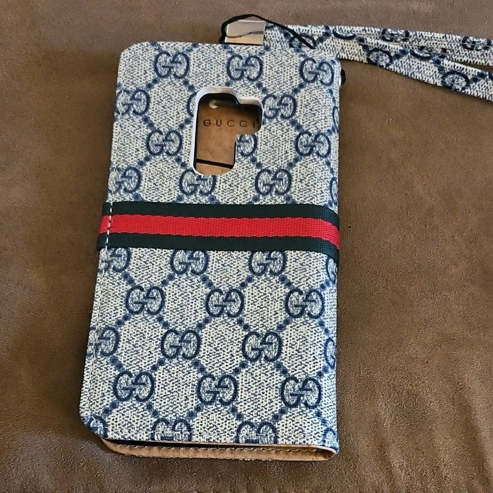 Samsung Blue Patterned Phone Wallet with Red Stripe